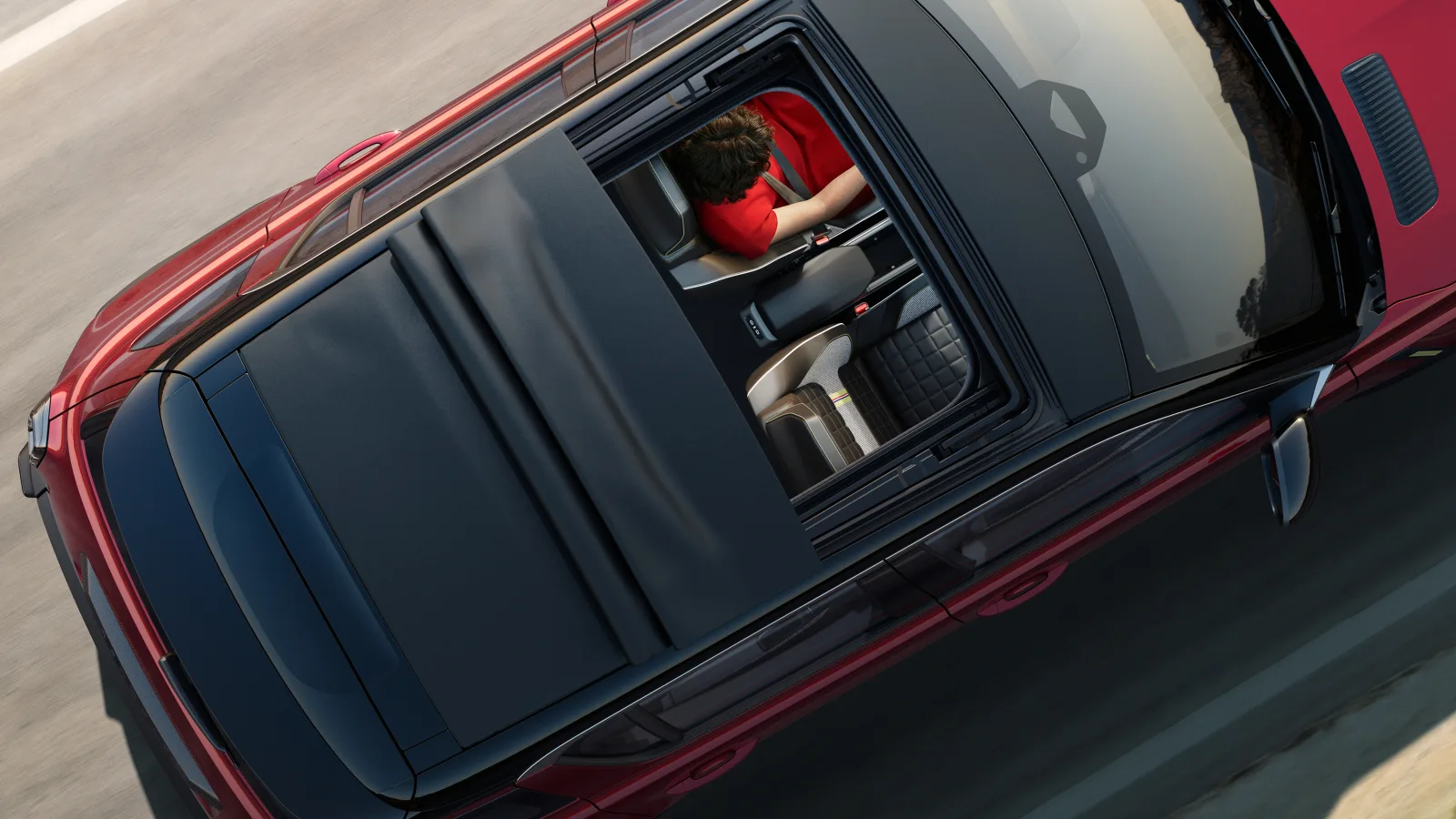 Renault 4 E-Tech Electric Plein Sud — pohled shora s otevřenou plátěnou střechou