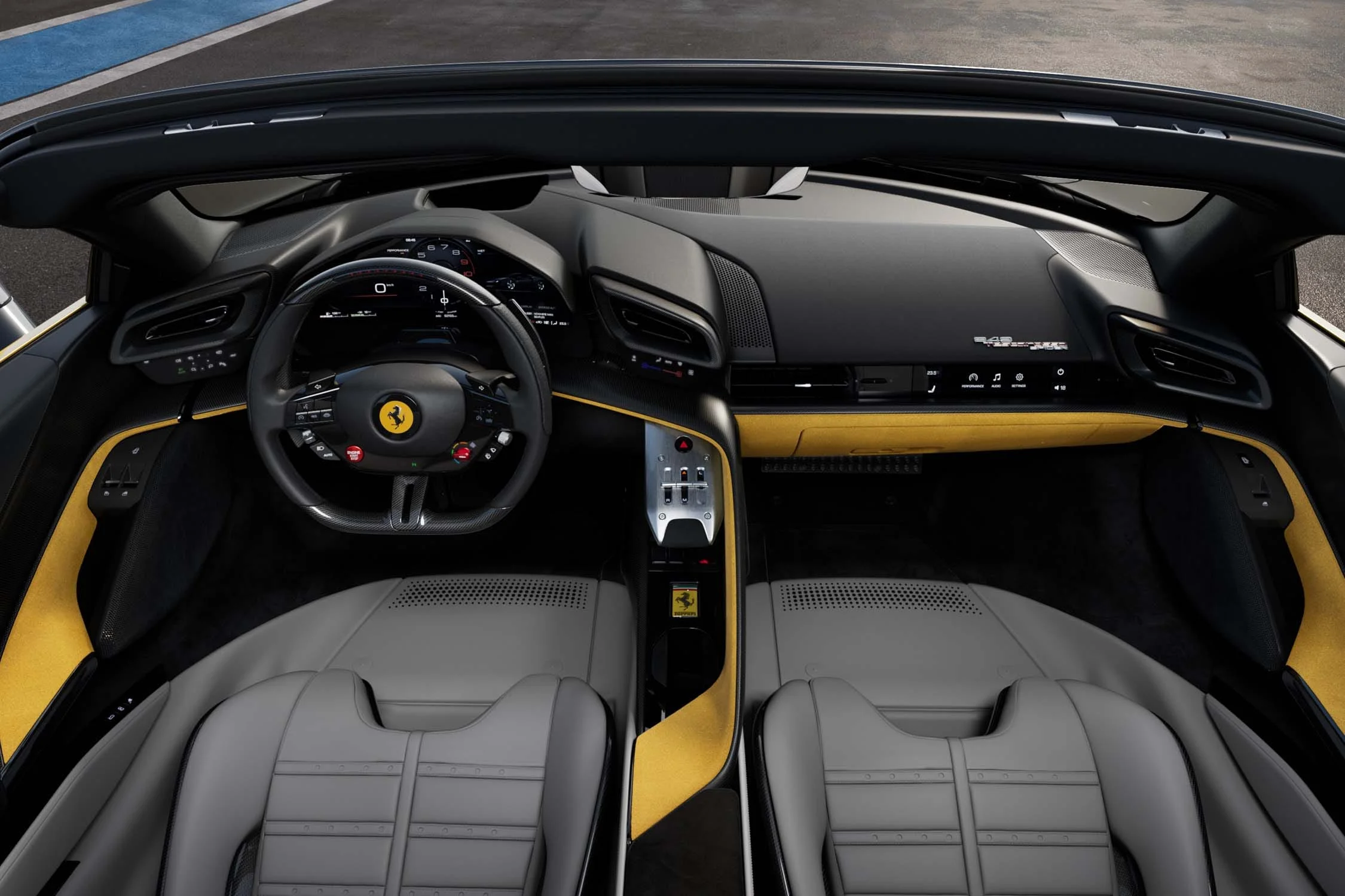 Interiér Ferrari 849 Testarossa s volantem a digitálním přístrojovým štítem