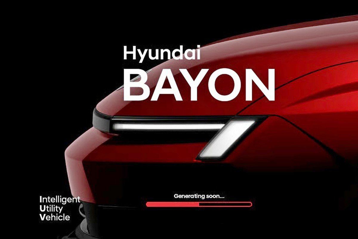 Teaserová grafika Hyundai BAYON s označením Intelligent Utility Vehicle a ukazatelem Generating soon, v pozadí detail přední světelné signatury H-Edge na červené karoserii