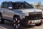 Neoficiální ilustrace budoucího Jeepu Renegade od Motor.es, stříbrné SUV zepředu, registrační značka JJ 616 AV