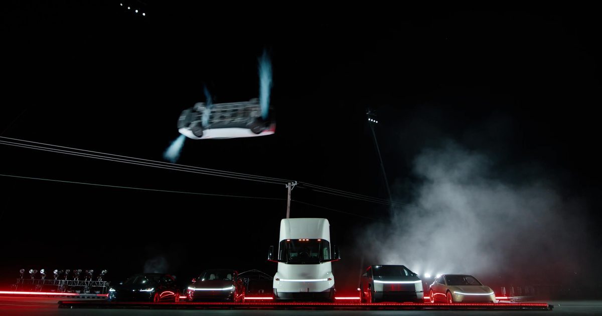 Tesla Roadster vzhůru koly při kickflipu